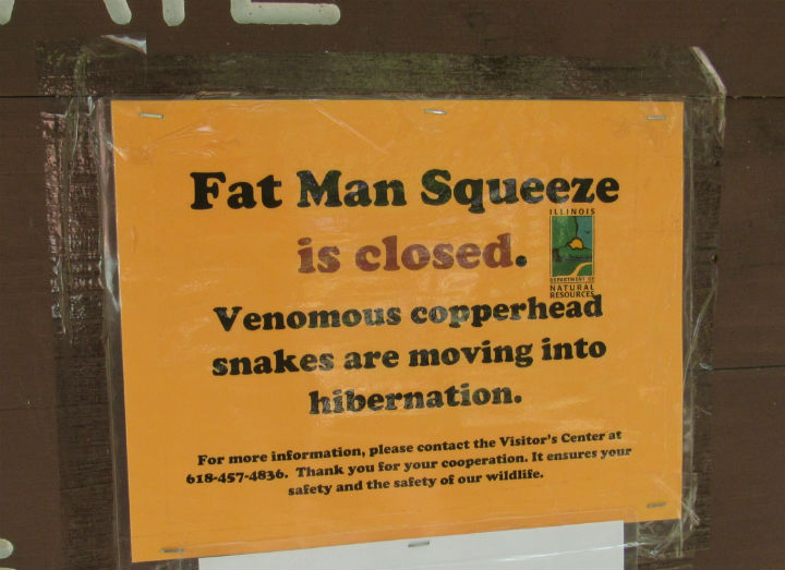 Fat Man Squeeze Sign 